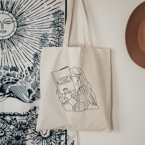 A BIT OF LIGHT READING TOTE BAG